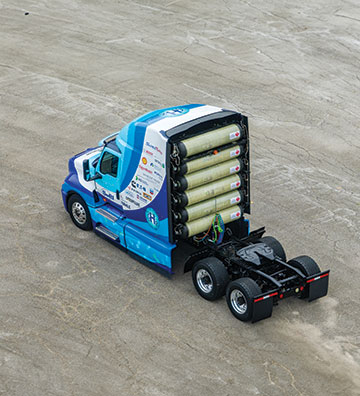 A photo of the Hydrogen Internal Combustion Engine demonstration vehicle seen from behind. 