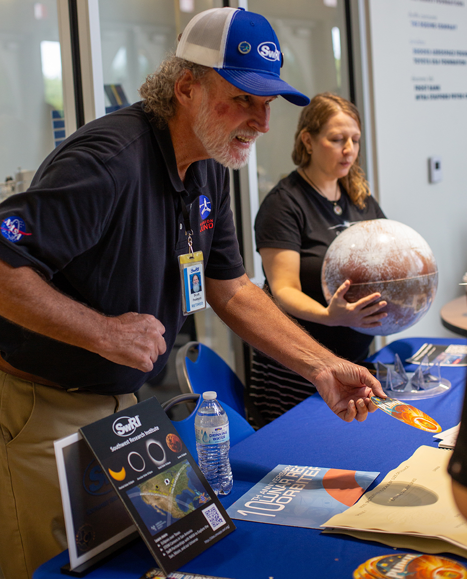 SwRI staff members sharing eclipse materials