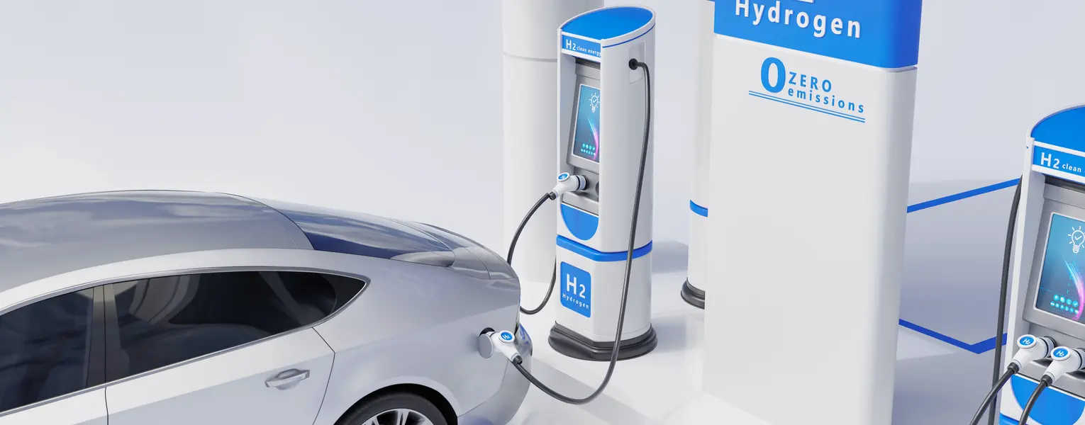 graphic depicting car being charged with a pump labeled H2 Hydrogen