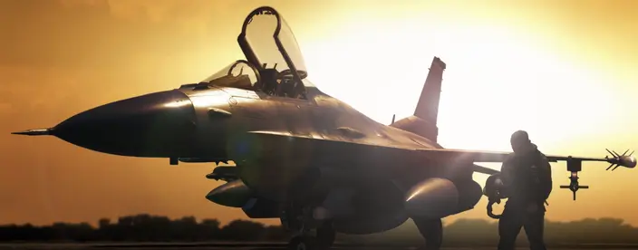 Military jet in silhouette with pilot walking away