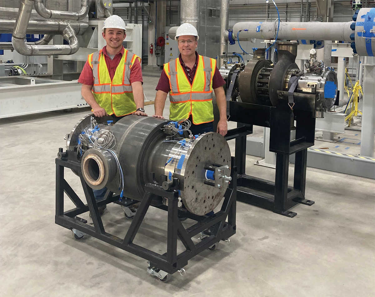John Klaerner (left), lead turbine engineer and Dr. Jeff Moore (right), principal investigator standing behind the recently assembled sCO2 turbine