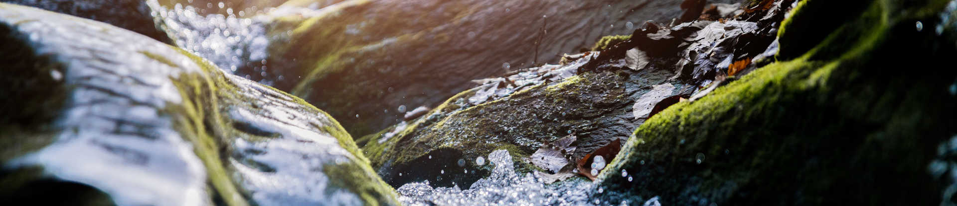 Natural water flowing over rocks