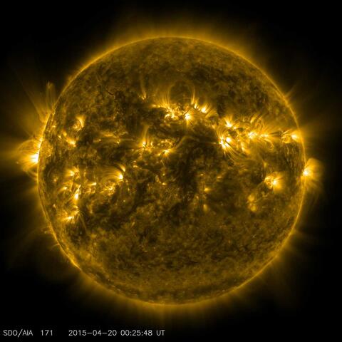 Glowing yellow sun against a black background