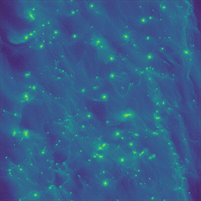 snapshot from the simulation shows the vertically integrated density of solids, projected  on the protoplanetary disk plane.