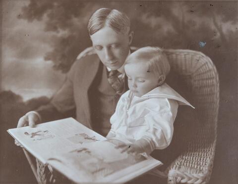 Tom Slick Sr. reads to young Tom Slick