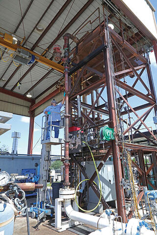 Large pipes and equipment on metal scaffolding