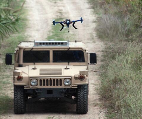 Image: Driverless vehicle  autonomously controls an aerial drone