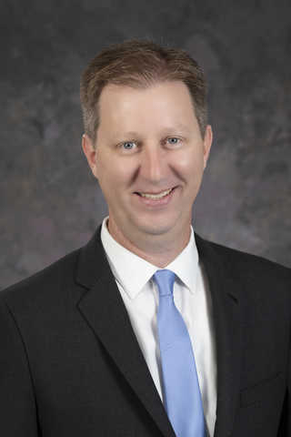 Professional portrait of Dr. Nicholas Mueschke