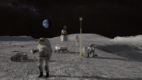 Surface of the Moon with astronauts and equipment 